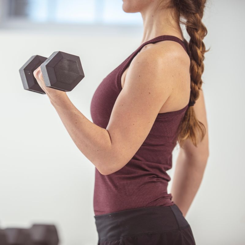 Woman Lifting Weights Image of Woman Lifting Weights
